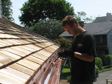 soldering at the seams of the gutter