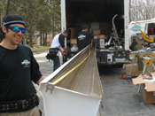 Forming aluminum gutters before installation in Minneapolis